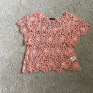Peach cotton lace top with flutter sleeves.